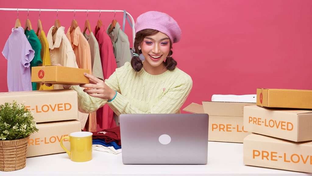 a person reselling secondhand items online through a laptop