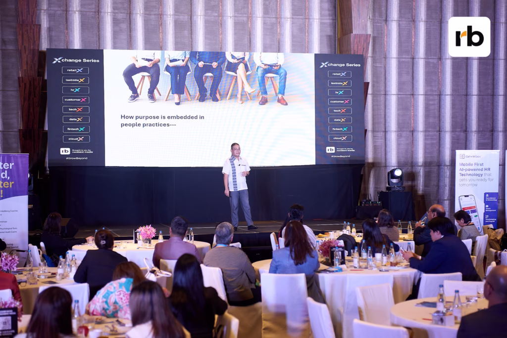 Michael Angelo E. Malicsi delivering a keynote on purpose-driven culture at hrX Philippines 2025, Grand Hyatt BGC.