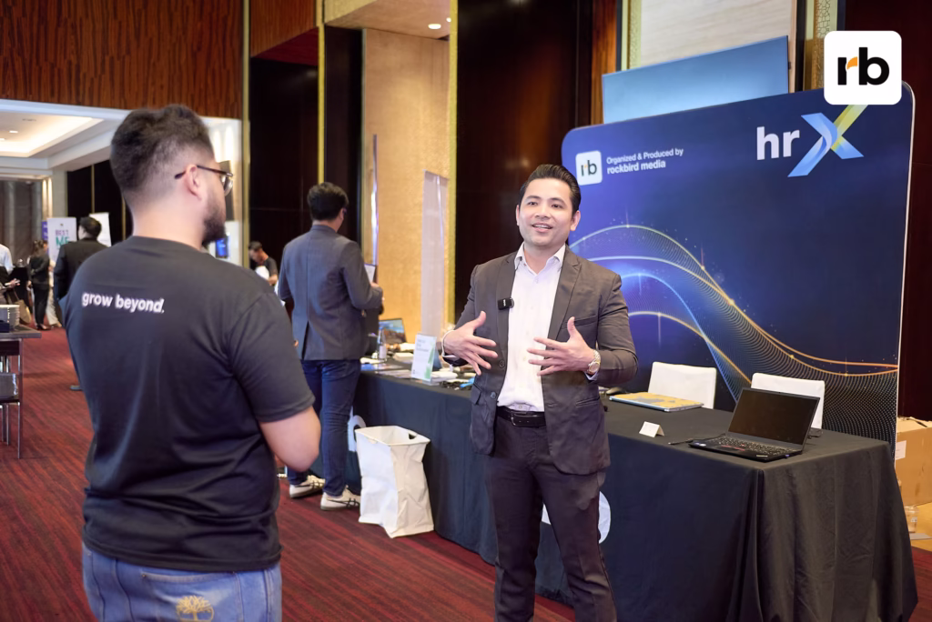 Vincent Benedicto speaking at HRX Philippines 2025, addressing the future of hybrid work and AI ethics.