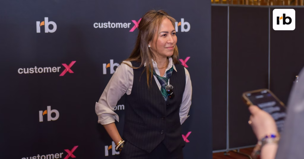 Mia Bulatao speaking at CustomerX 2025 about Pick.A.Roo’s CX strategy